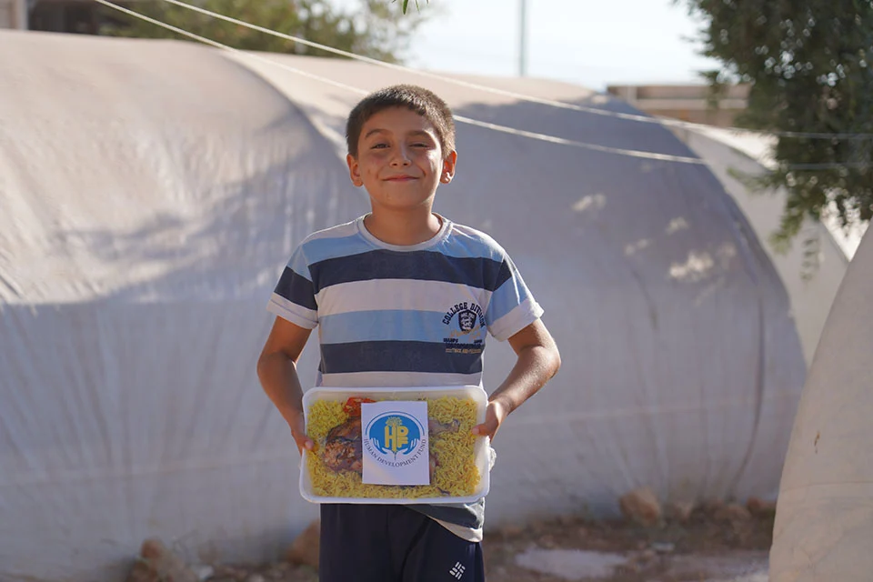 Stock Donation child with food